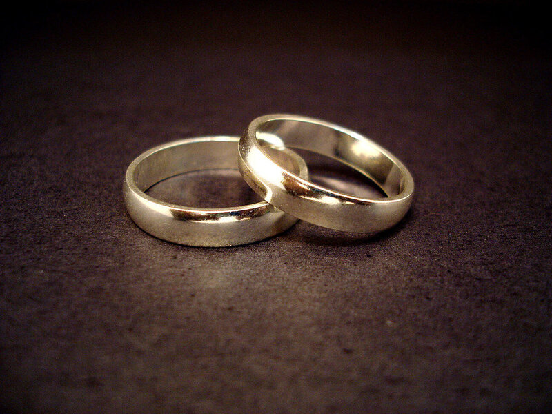 two silver wedding rings