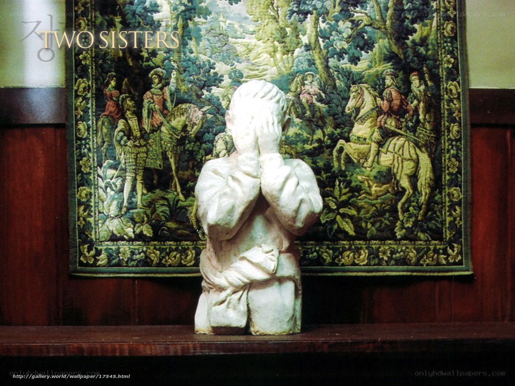 Two Sisters statue and tapestry