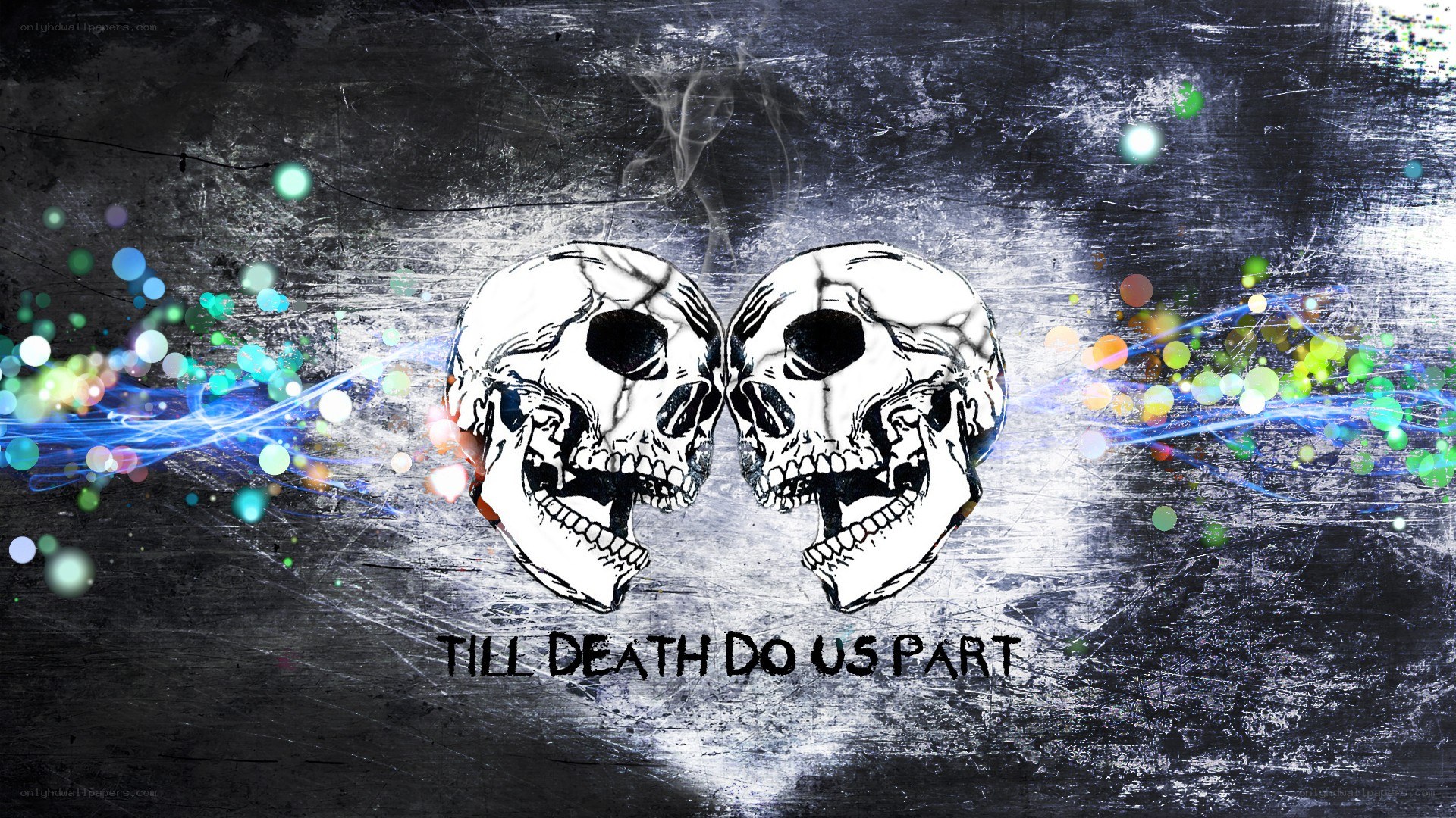 Two skulls with colorful lights