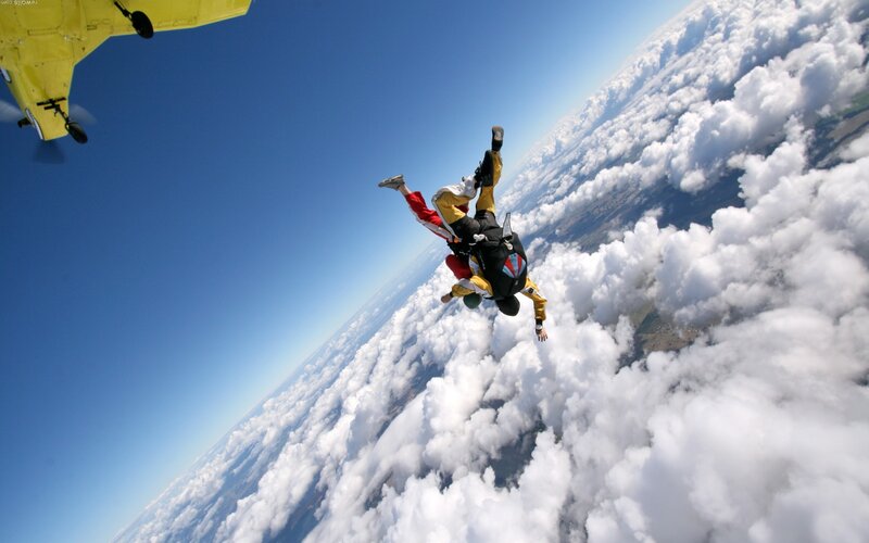 Two Skydivers in Freefall — Blue, Dramatic, Afternoon, Photograph, Airplane