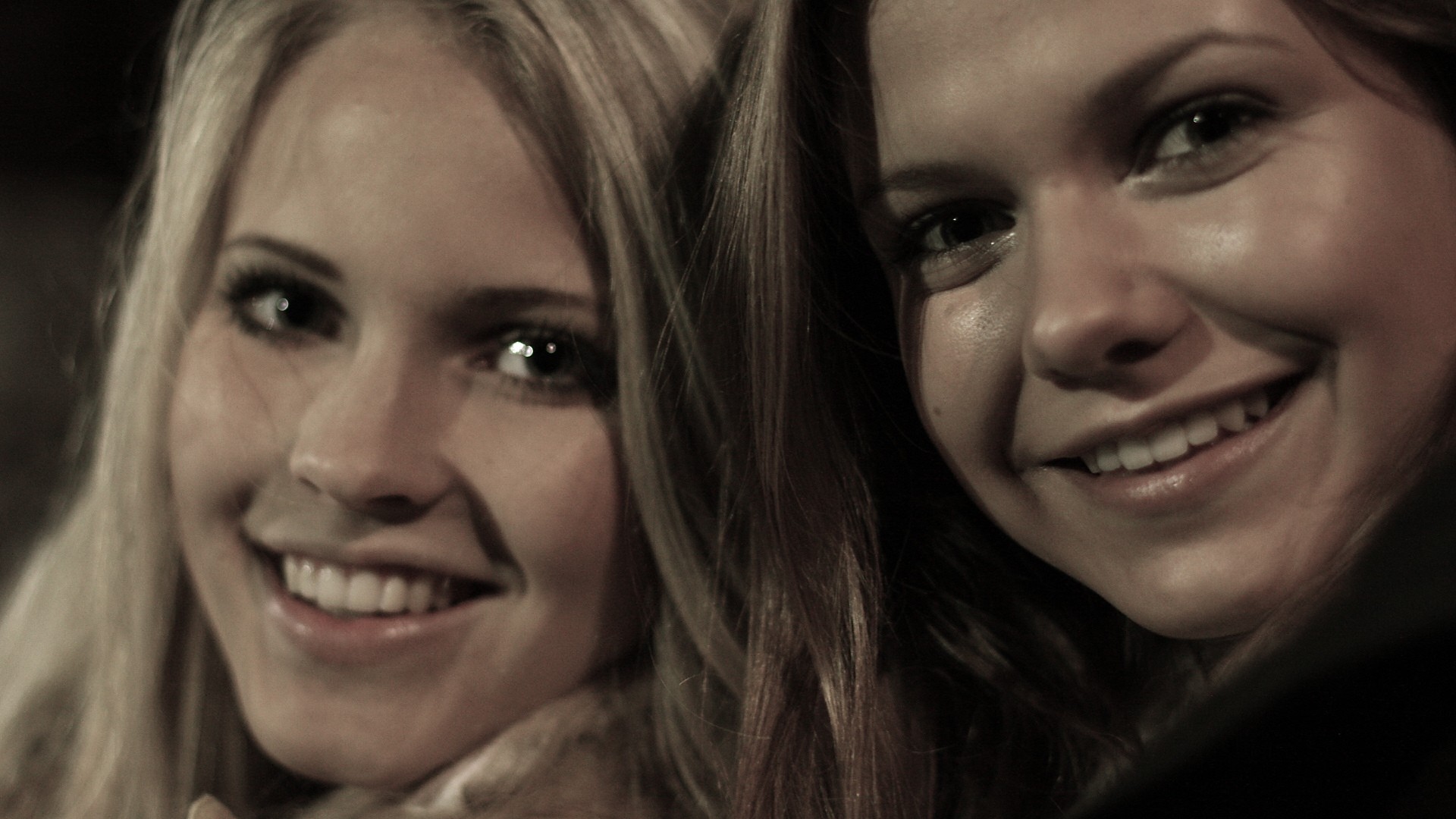 two smiling women close-up