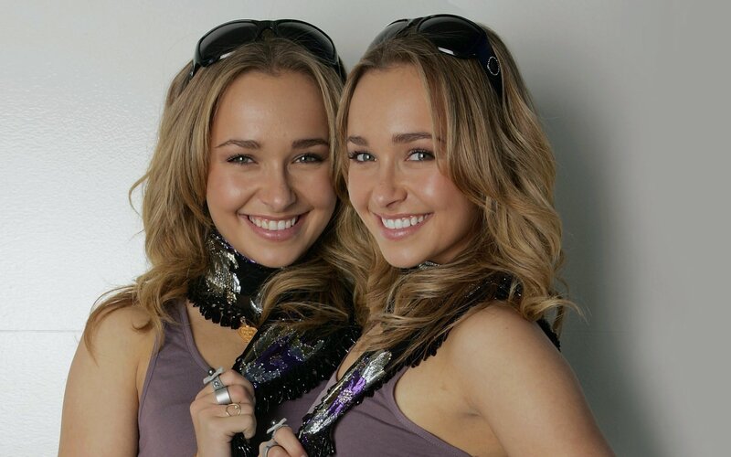 two smiling women with sunglasses