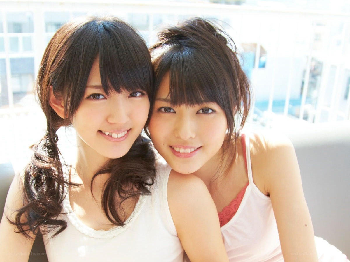 two smiling young women