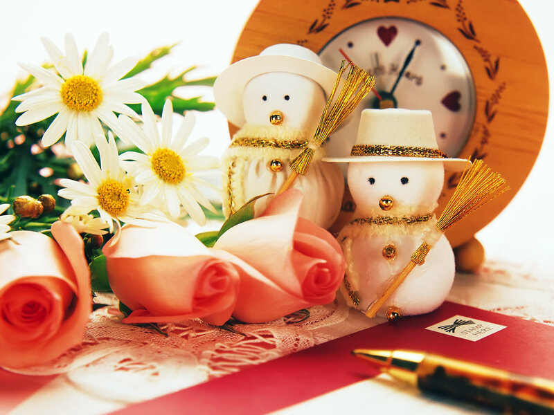 Two Snowmen Figurines