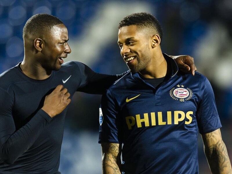 Two Soccer Players — Blue, Celebratory