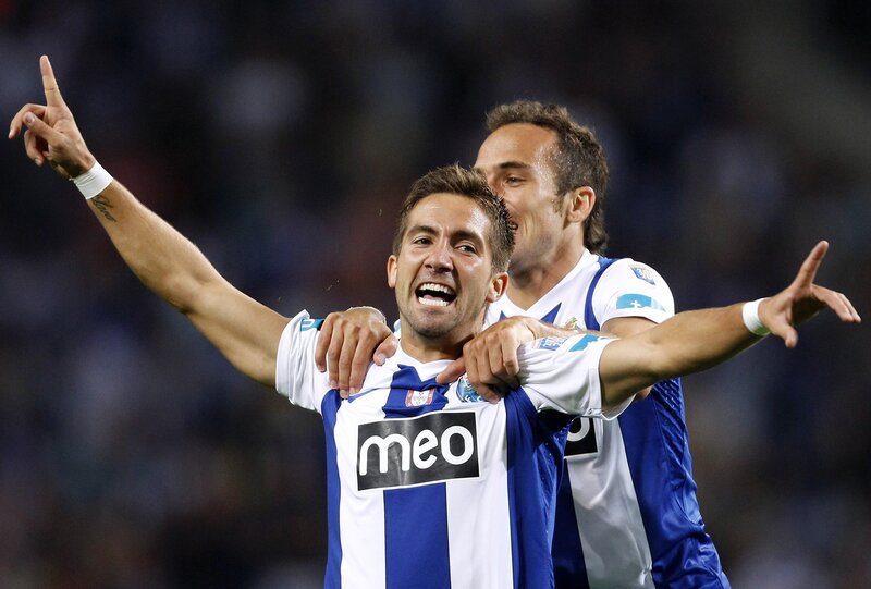 Two Soccer Players Celebrating — Blue, Celebratory, Night, Photograph