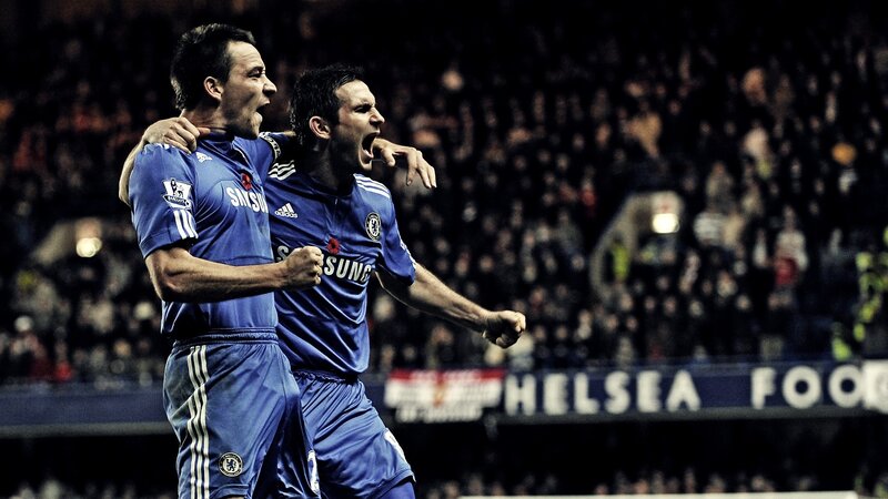 Two Soccer Players Celebrating — Blue, Energetic