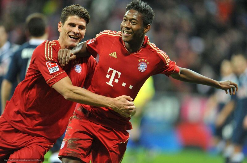 Two Soccer Players Celebrating — Red, Celebratory, Night