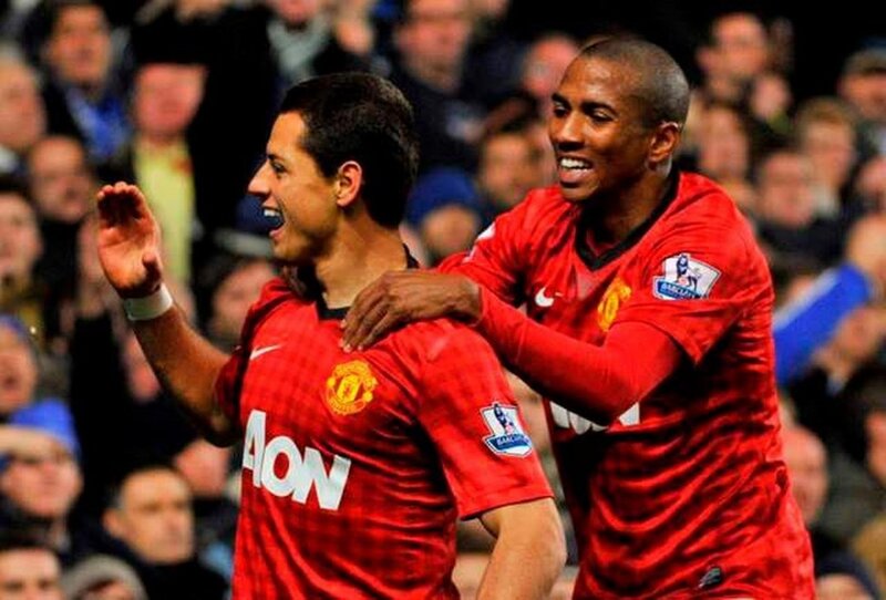 Two Soccer Players Celebrating — Red, Celebratory