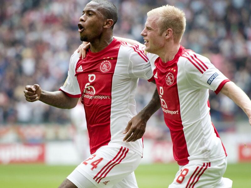 Two Soccer Players Celebrating — Red, Energetic