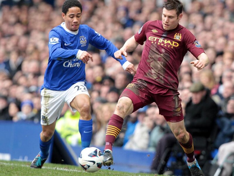 Two Soccer Players Competing — Blue
