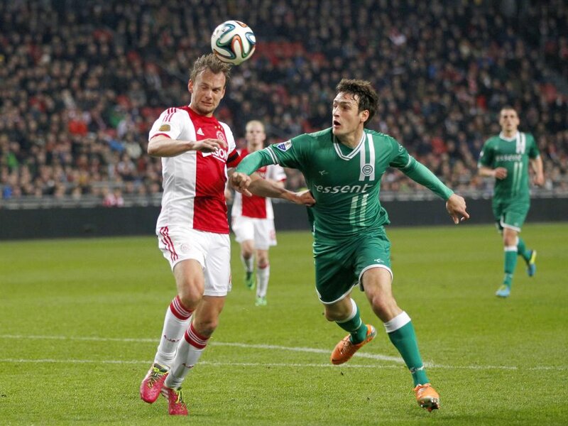 Two Soccer Players Competing — Green