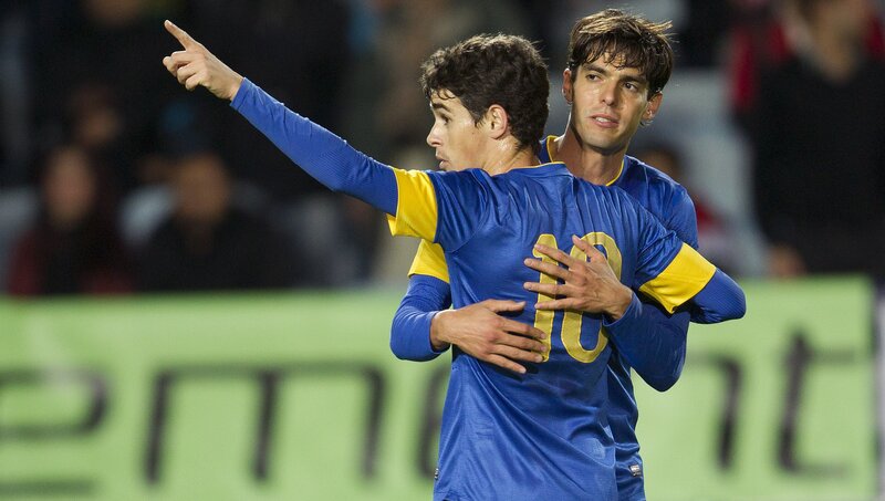 Two Soccer Players Hugging — Blue, Celebratory, Night, Photograph