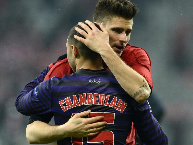 Two Soccer Players Hugging