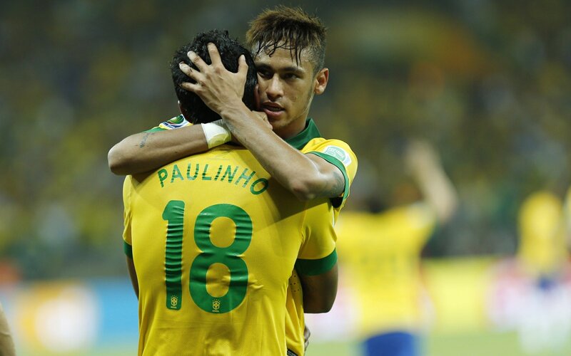 Two Soccer Players Hugging — Yellow