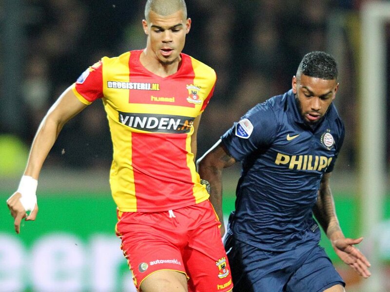 Two Soccer Players — Red, Competitive, Night