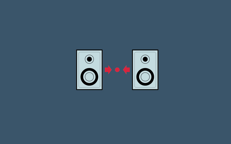 two speakers facing each other