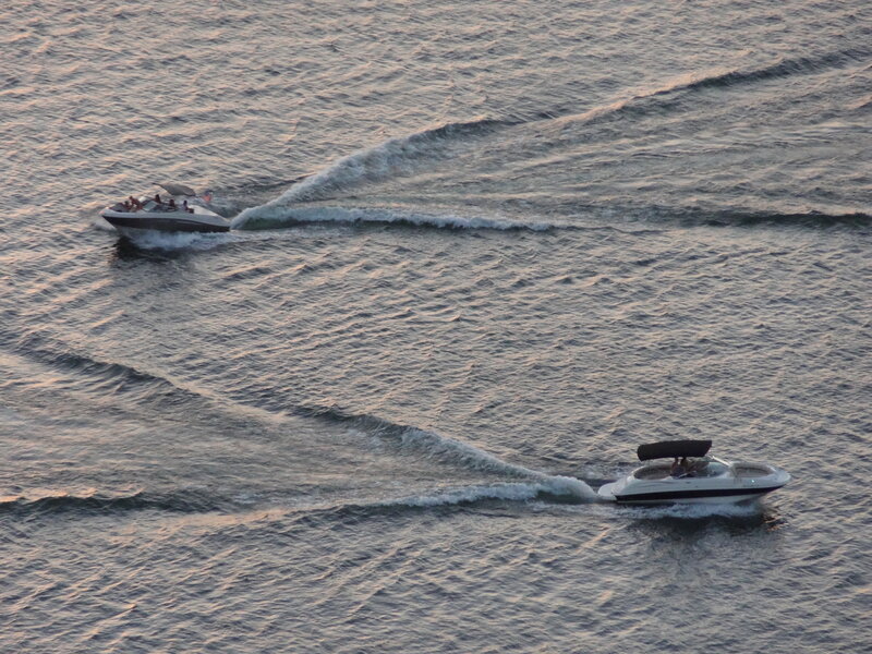 Two Speedboats on Water
