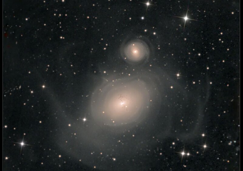 Two Spiral Galaxies — Black, Serene