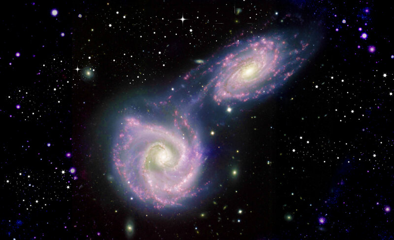 Two Spiral Galaxies — Purple