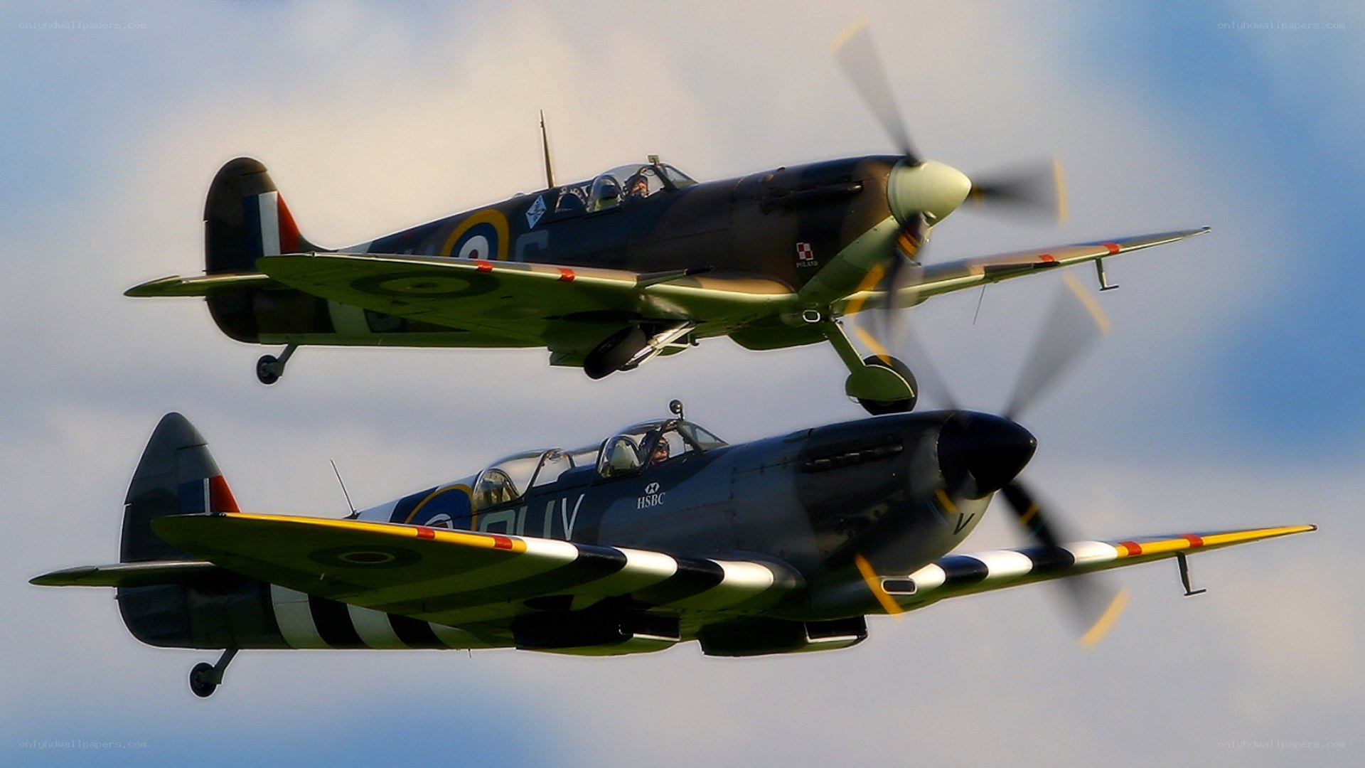 Two Spitfire planes in flight