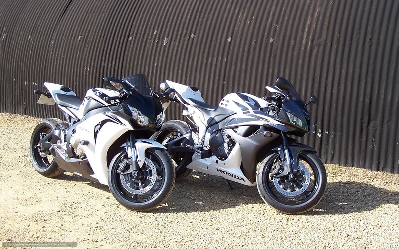 Two Sport Motorcycles — White
