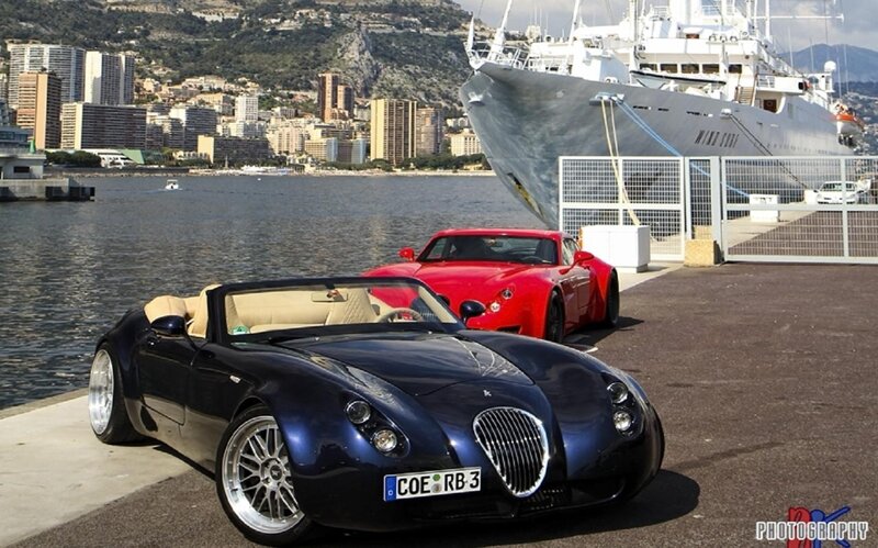 Two Sports Cars at Dock