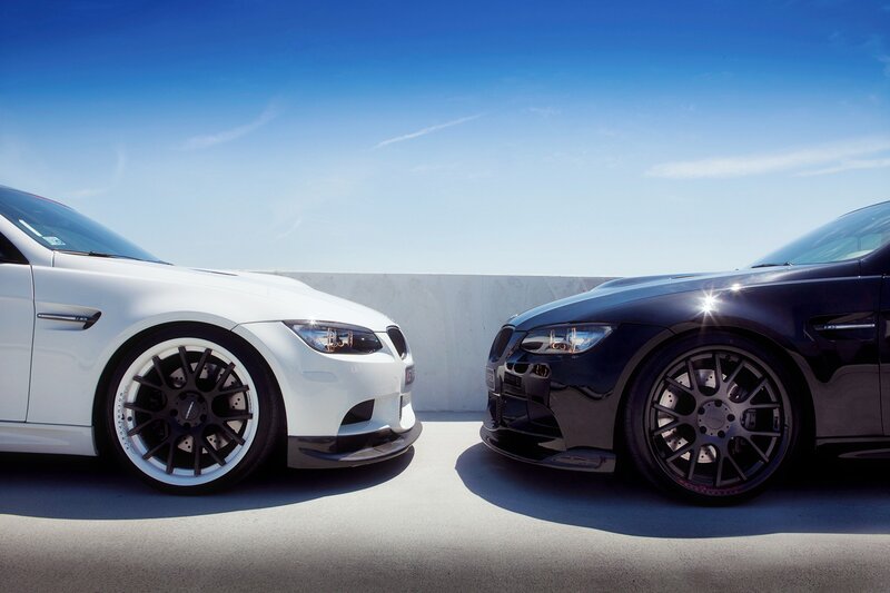 Two sports cars facing each other
