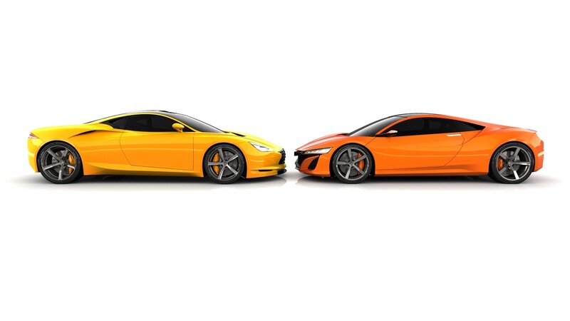 Two sports cars facing each other