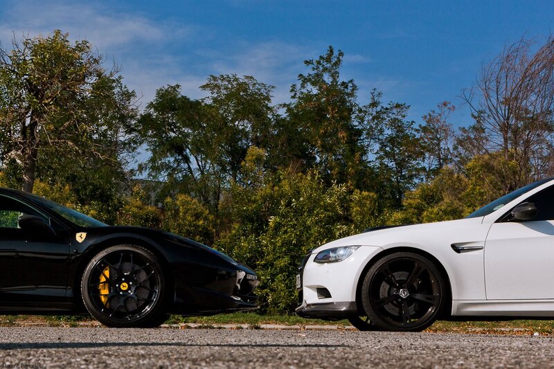 Two sports cars facing each other