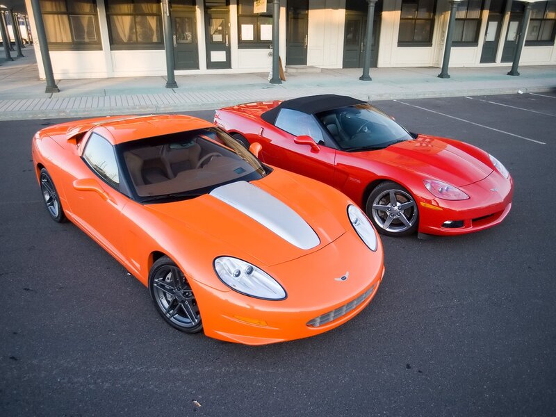 Two sports cars in a parking lot