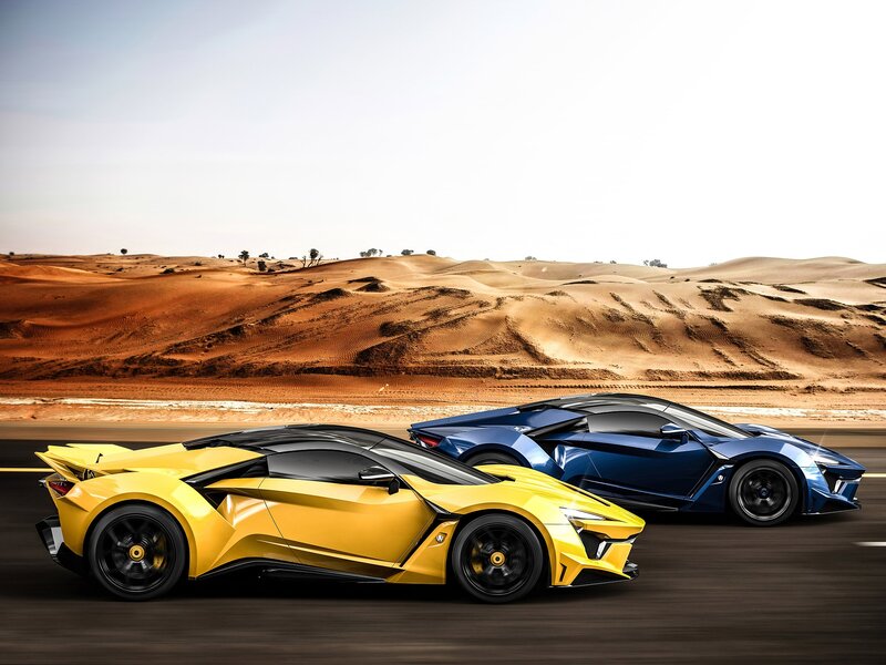 Two Sports Cars in Desert