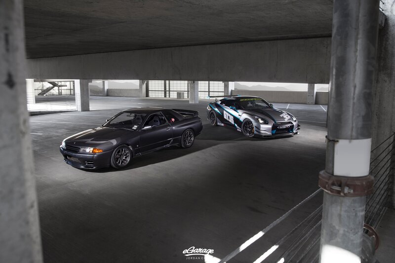 Two Sports Cars in Garage — Black, Dramatic