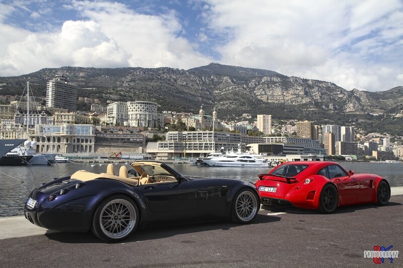 Two Sports Cars on a Pier