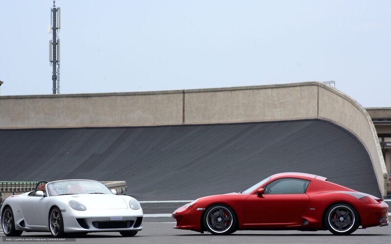 Two sports cars on a track