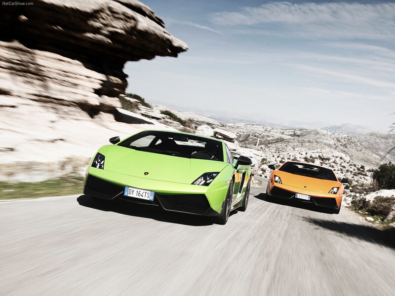 Two Sports Cars on Road