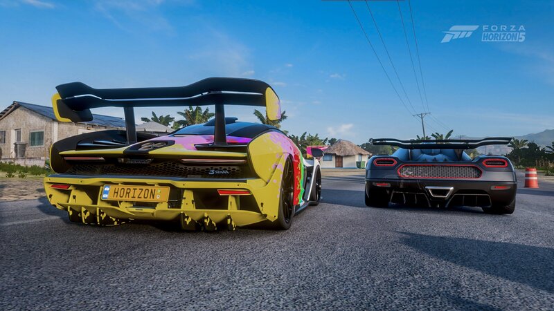 Two Sports Cars on Road — Yellow, Bright, Sunny