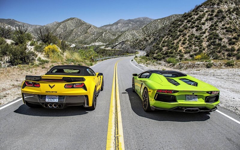 Two Sports Cars on Road — Yellow, Open