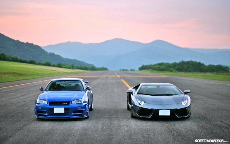 Two Sports Cars on Runway