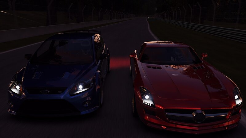 Two Sports Cars on Track — Red, Dark
