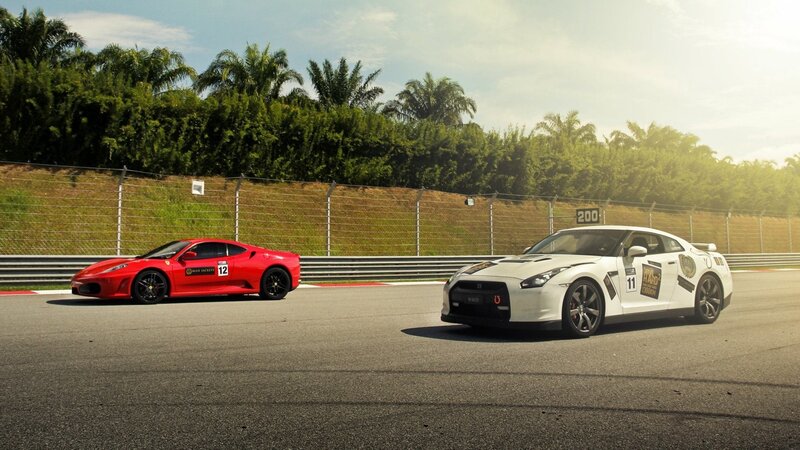 Two Sports Cars on Track — Red