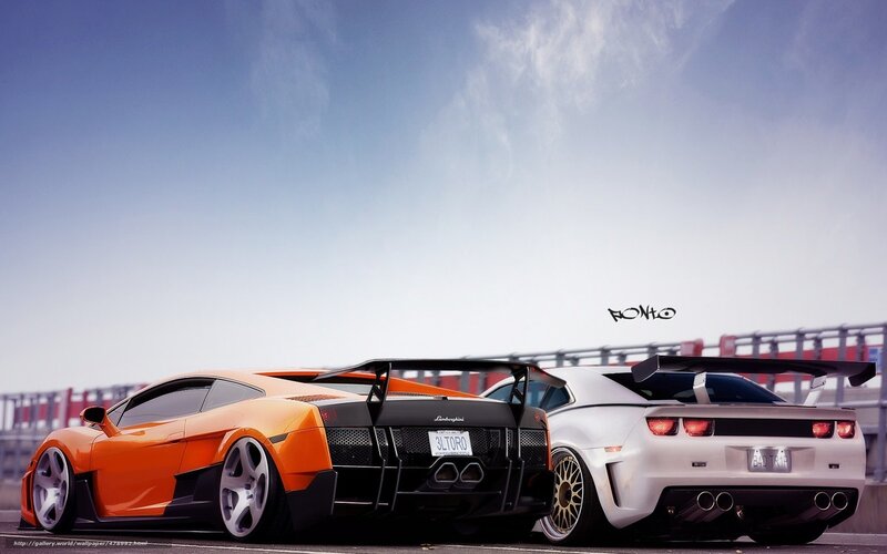 Two Sports Cars — Orange, Dramatic, Afternoon