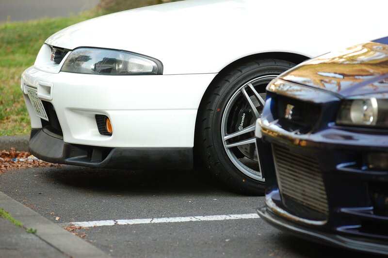 Two sports cars parked