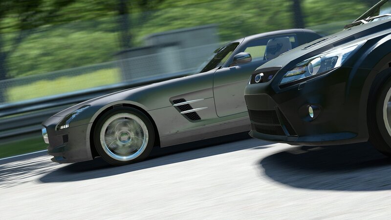 Two sports cars racing