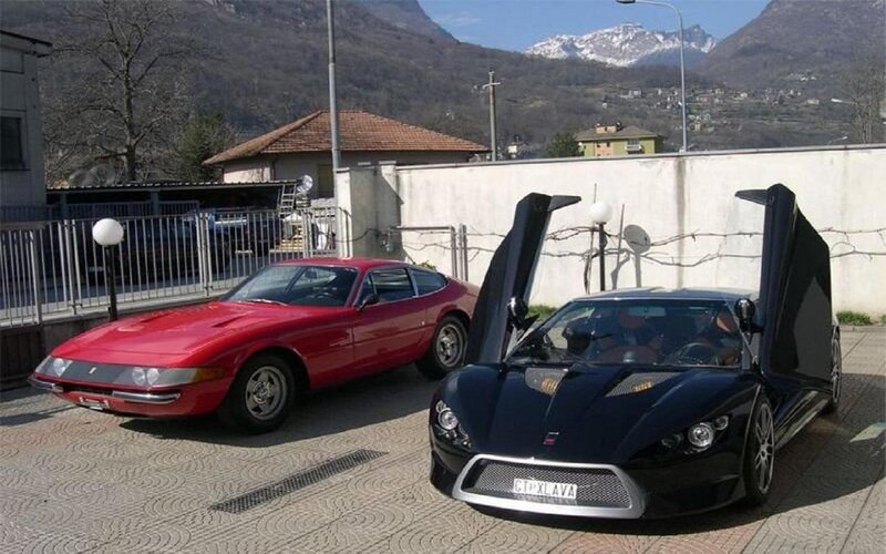 Two Sports Cars — Red, Calm