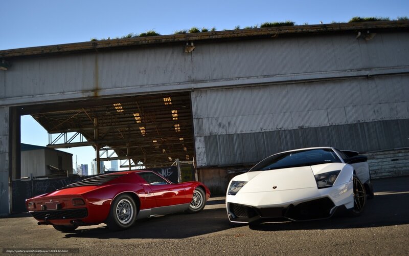 Two Sports Cars — Red, Dramatic, Afternoon, Photograph, Building