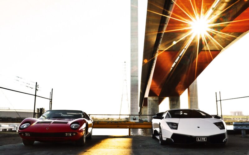 Two Sports Cars under Bridge — Red