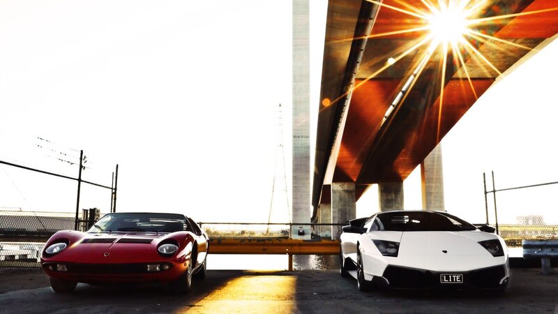 Two Sports Cars under Bridge