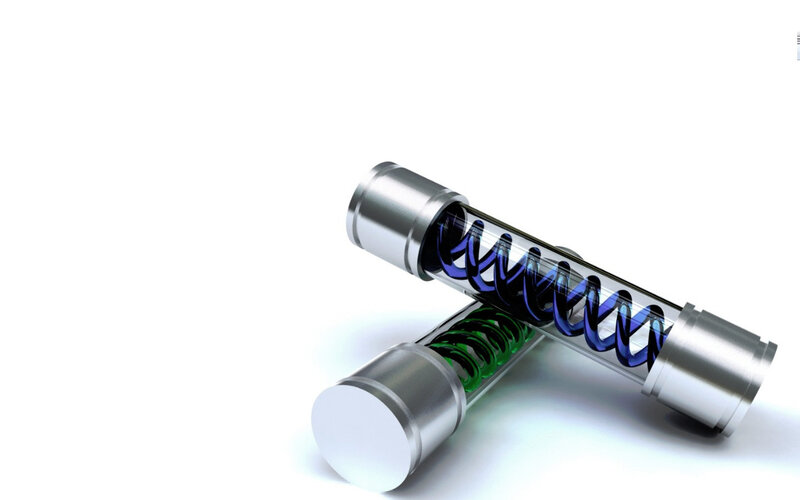 two spring-loaded cylinders