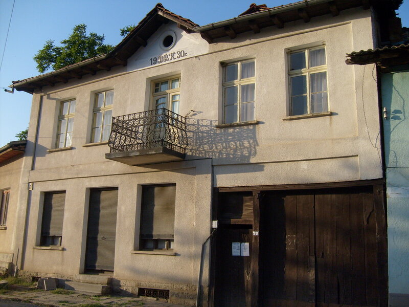 Two-story House with Balcony